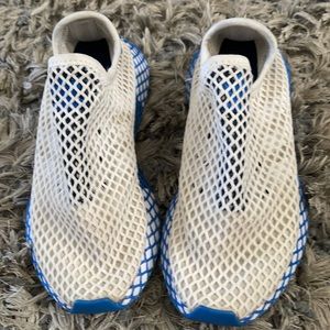 Adidas mesh net sneakers size 6.  Says kids 3 1/2